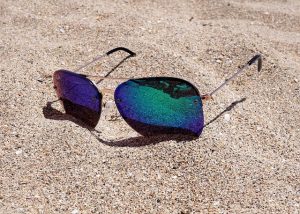 holidays - sunglases on the beach